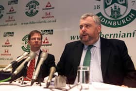 Malcolm McPherson, right, pictured when Hibs chairman back in 2002.