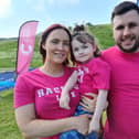 Flora Gentleman, four, is in remission from cancer and was the VIP starter at Sunday's Race for Life in Edinburgh. Here she is pictured with parents Stephanie and Jamie.