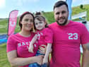 Flora Gentleman, four, is in remission from cancer and was the VIP starter at Sunday's Race for Life in Edinburgh. Here she is pictured with parents Stephanie and Jamie.