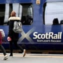 Passengers travelling on trains between Edinburgh and Glasgow have been urged only to do so if their journeys are essential. Picture: John Devlin