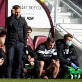Grim faces on the Hibs bench at Tynecastle