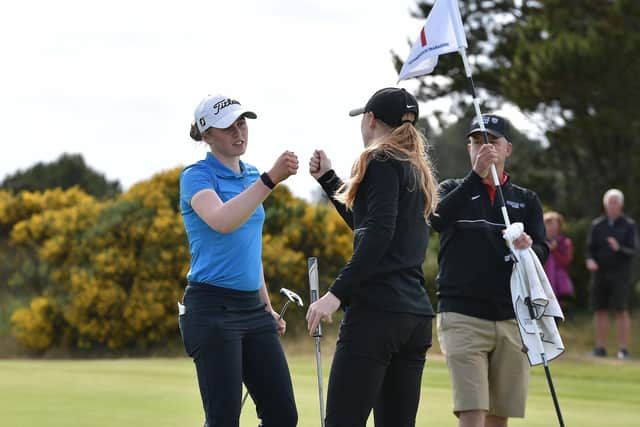 Hannah Darling congraulates Louise Duncan after their semi-final match in Ayrshire. Picture: Charles McQuillan/R&A/R&A via Getty Images.