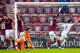 Regan Tumilty scores what proved to be the crucial third goal for Raith in their win over Hearts. Picture: SNS