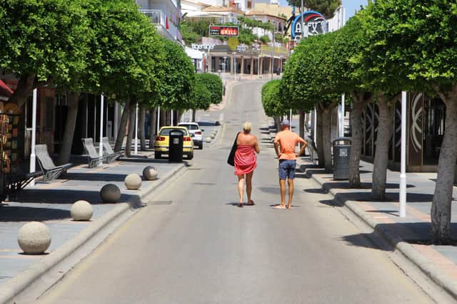 A lone couple in Magaluf. Pictures/video: Ruairidh Mason