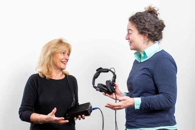 Hearing Diagnostics co-founder and CEO, Claudia Freigang (right), explains the hearing test process to volunteer Susan Christie. Picture: Jamie Williamson