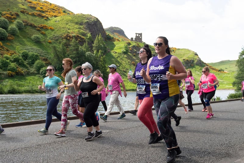 Some of those taking part in the Edinburgh Marathon Festival on their route through Holyrood Park.