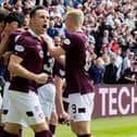 Lawrence Shankland celebrates after Yutaro Oda opened the scoring against Hibs in the last game of the cinch Premiership season. Picture: SNS