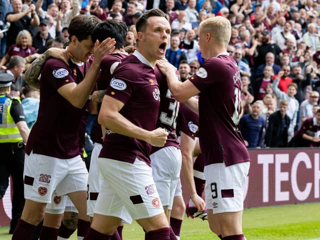 Lawrence Shankland celebrates after Yutaro Oda opened the scoring against Hibs in the last game of the cinch Premiership season. Picture: SNS