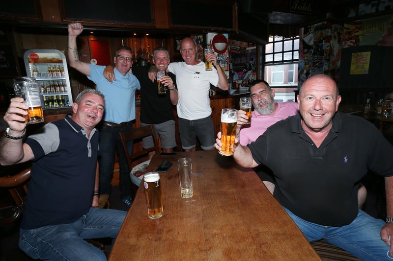 From left, Adam Brown, Garyn Starks, Lee Simmons, Bobby Madwick, Barry Byng and Gordon Perry. Fans watch England v Ukraine in the quarter finals of Euro 2020, in The Kings pub, Albert Rd, Southsea. Picture: Chris Moorhouse (jpns 030721-13)