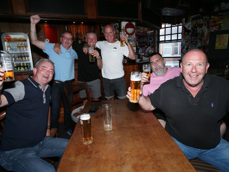 From left, Adam Brown, Garyn Starks, Lee Simmons, Bobby Madwick, Barry Byng and Gordon Perry. Fans watch England v Ukraine in the quarter finals of Euro 2020, in The Kings pub, Albert Rd, Southsea. Picture: Chris Moorhouse (jpns 030721-13)
