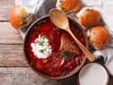 Ukrainian borsch soup and garlic buns on the table. Pic:Getty