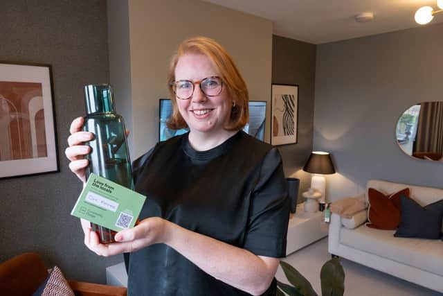 Claire McLoughlin of Six Acres with her items inside the showhome