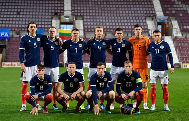 Kyle Magennis and Ryan Porteous, back row third and fourth left, have been named in Scot Gemmill's Under-21 squad