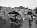 The Musselburgh Crusaders riding club ride over the River Esk on the traditional Crusader's Chase.during the Musselburgh Festival in July 1965.