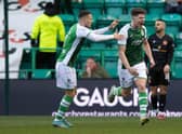 Kevin Nisbet celebrates after drawing Hibs level in the first half. Picture: SNS