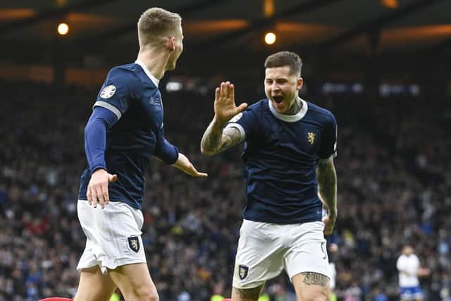 Lyndon Dykes celebrates with Scott McTominay (left) after the Manchester United midfielder made it 2-0 to Scotland against Cyprus. Picture: SNS