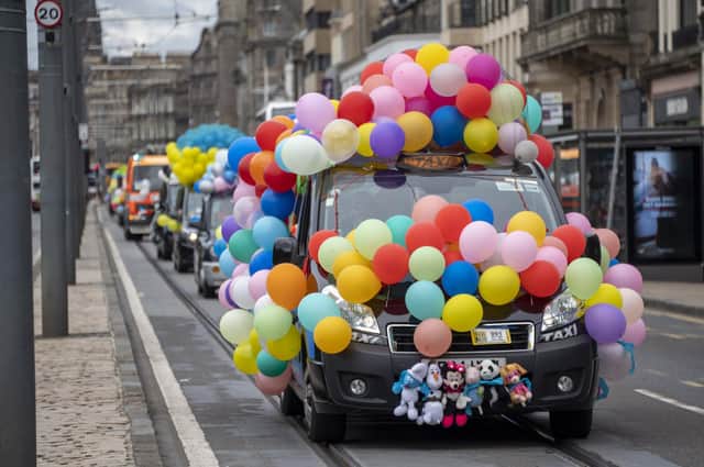 Inflated fuel prices weren't the only stories making the news yesterday as Edinburgh taxi drivers attached scores of inflated balloons to their vehicles.