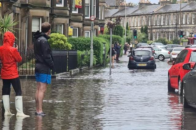 A number of Edinburgh streets were flooded after torrential rain fell on Sunday