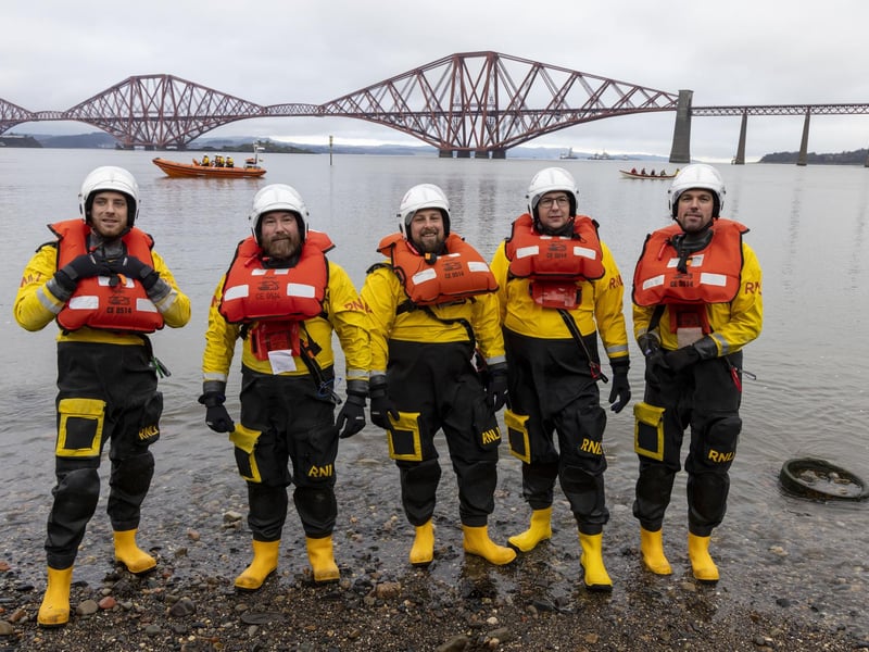 Volunteers from the RNLI keep an eye on proceedings