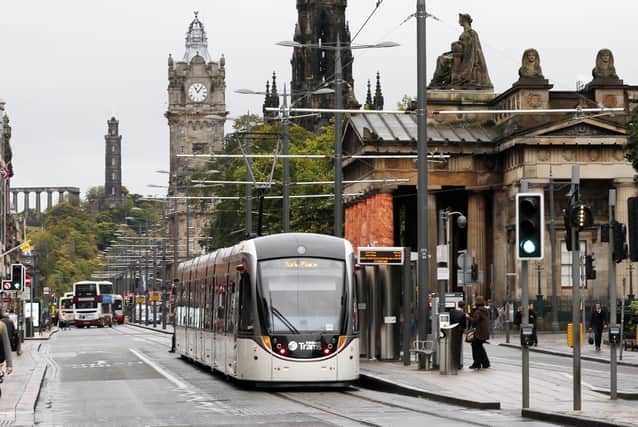 A tram on Edinburgh's Princes Street before the coronavirus outbreak struck (Picture: Danny Lawson/PA Wire)