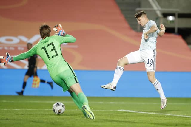Hibs striker Kevin Nisbet scores his first Scotland goal against the Dutch. Pic: AP
