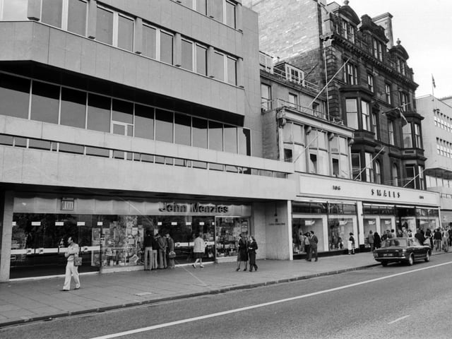 John Menzies, newsagents and stationers, and Smalls department store in Princes Street Edinburgh, July 1977.