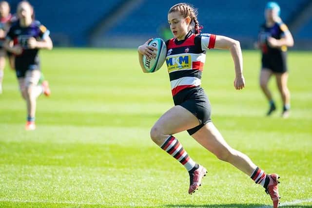 Mike Flynn's daughter Nicole playing rugby.
