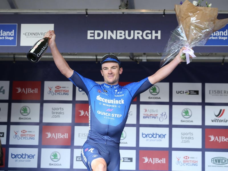 Belgium's Yves Lampaert celebrates after winning stage seven.
