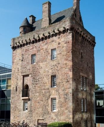 Sometimes referred to as Merchiston Castle, this five-storey L-plan tower was built around 1454 by Alexander Napier, the second Laird of Merchiston. The building remained in the Napier family for several centuries and it is recorded that John Napier, the inventor of logarithms was born here in 1550. How appropriate then that the tower is now situated in the grounds of modern-day Napier University. The tower was built upon a rocky outcrop, which can still be seen on two sides of the building.
