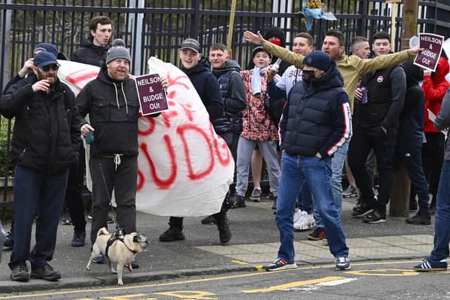 Supporters protested against the club's board at the next home game, against Queen of the South, after the Brora Rangers defeat. Picture: SNS