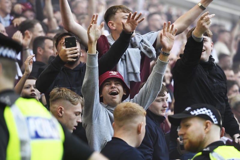 Hearts fans enjoy themselves during the opening derby of the season at Easter Road in August