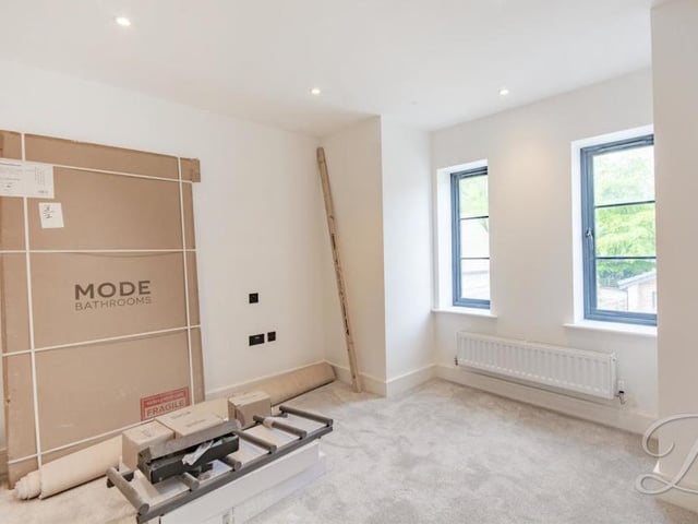 The bedrooms are beautifully presented, but also offer a perfect blank canvas, inviting you to add your personal touches. This one has two windows overlooking the front of the property.