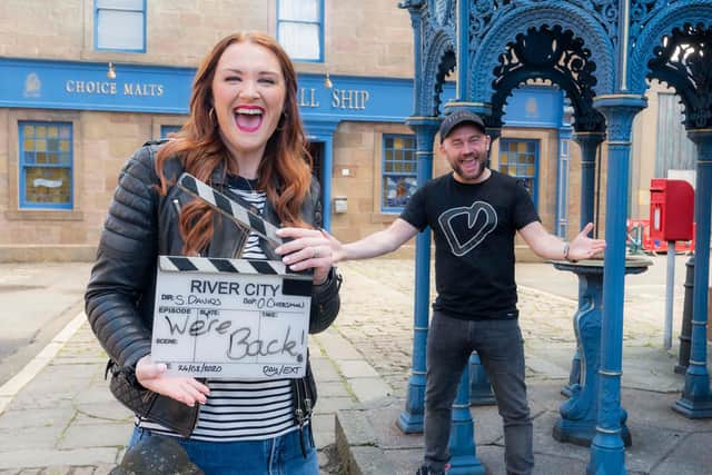 Gayle Telfer-Stevens, who plays Caitlin McLean, and Stephen Purdon, who plays Bob O'Hara, celebrating the resumption of filming of River City last August. Picture: Alan Peebles