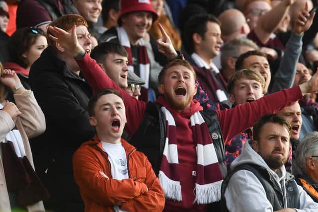 Hearts fans in attendance in the away end at Fir Park. Picture: SNS