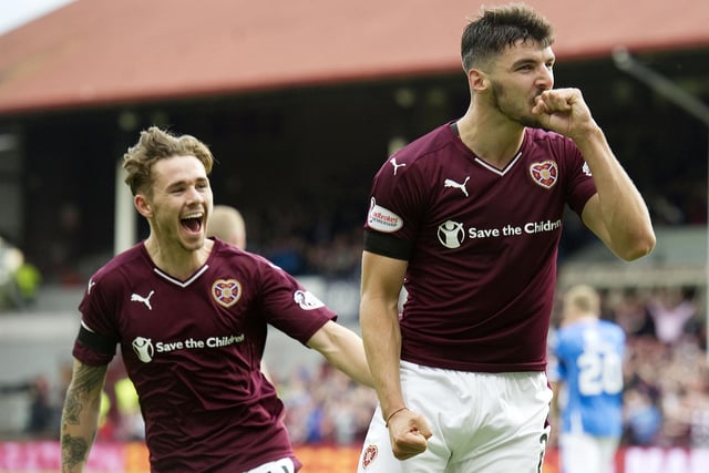 Callum Paterson celebrates as Sam Nicholson rushes to join his team-mate in a scintillating battle at Tynecastle. Hearts built up a 3-1 through goals from Juanma, Paterson and Jamie Walker before St Johnstone tied it up. Nicholson then netted the winner.