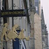 A sign outside the Museum of Childhood on Edinburgh's historic Royal Mile. (Photo by © Vittoriano Rastelli/CORBIS/Corbis via Getty Images)