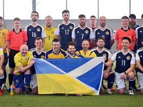 Stock photo by John Devlin 24/03/2022. Tartan Army Select stand in solidarity with Ukraine by teaming up for fan charity match at Toryglen Football Centre.