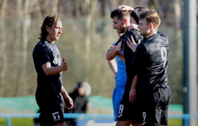 Musselburgh's Darren Downie is congratulated on the second of his three goals against Newtongrange Star. Pic: TSPL