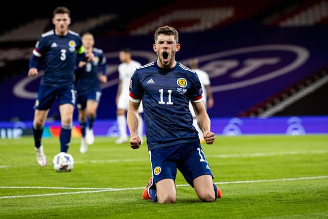 Ryan Christie celebrates after scoring for Scotland from the penalty spot.