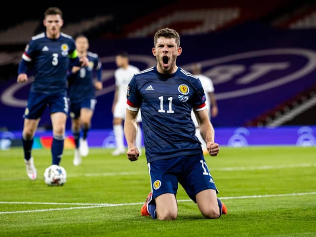 Ryan Christie celebrates after scoring for Scotland from the penalty spot.