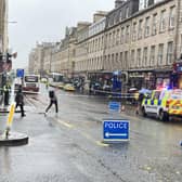 Edinburgh's South Bridge was closed for three hours after a pedestrian was hit by a bus