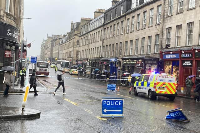 Edinburgh's South Bridge was closed for three hours after a pedestrian was hit by a bus
