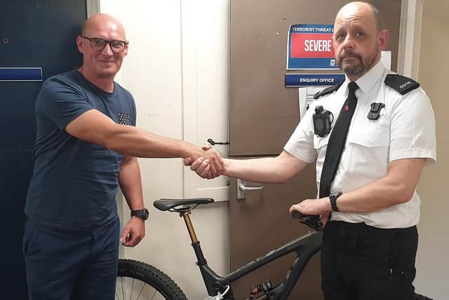The victim Jamie Taylor was presented with his bike by Constable Graham Ford from Wirral Community Policing Team.