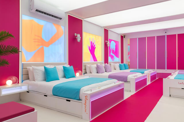 The main bedroom comes decorated with the usual tasteful fluorescent colours and catchphrases