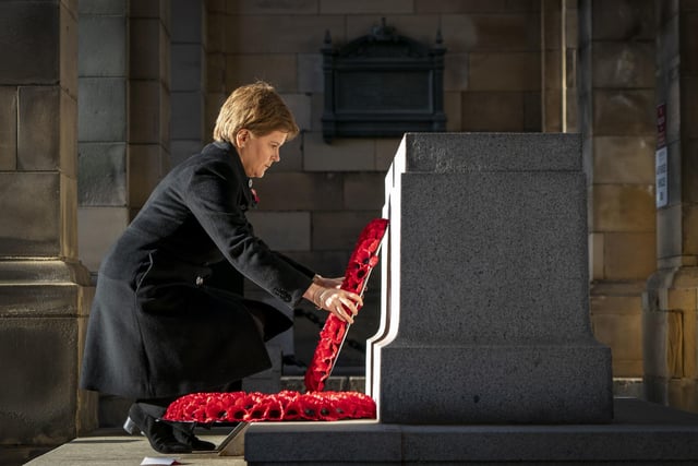 First Minister of Scotland Nicola Sturgeon lays a wreath at the Stone of Remembrance during a Remembrance Sunday service and parade in Edinburgh. Jane Barlow/PA Wire