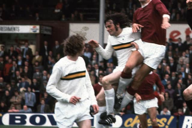 Alan Anderson wins a header at Tynecastle in 1973/1974. The centre-back was renowned for his aerial prowess