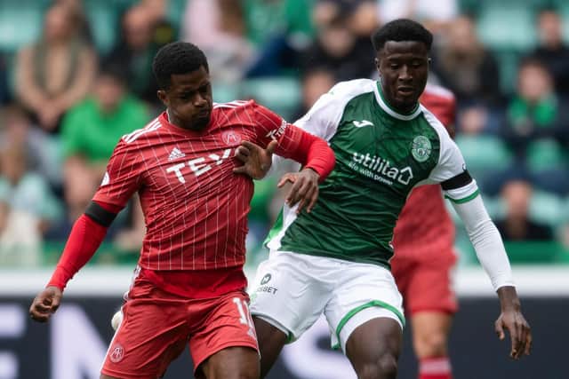 Kenneh battles Luis Lopes for the ball during the last meeting between Hibs and Aberdeen