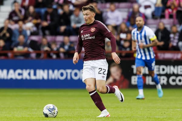 Hearts midfielder Aidan Denholm has an outside chance of a starting place against Rosenborg. Pic: SNS