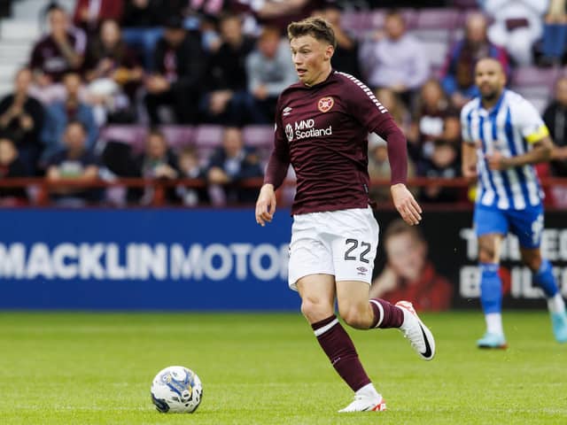 Hearts midfielder Aidan Denholm has an outside chance of a starting place against Rosenborg. Pic: SNS