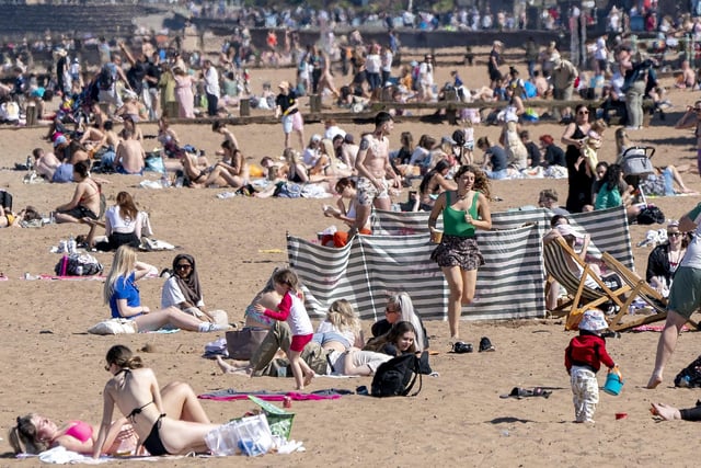 Hundred of people flocked to Portobello beach as Edinburgh basked in the sunshine on Tuesday.